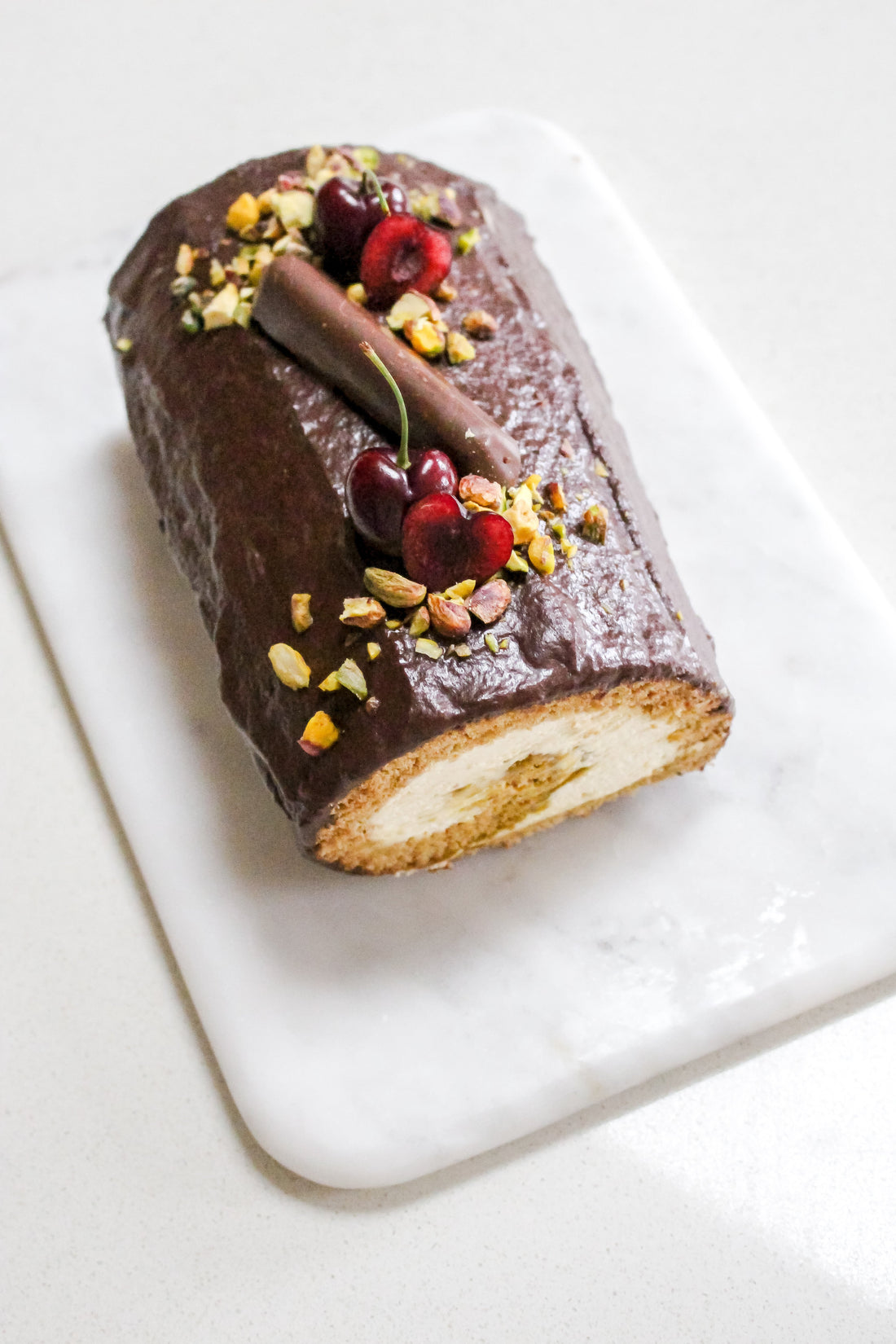 Loaded Pistachio and Chocolate Yule Log